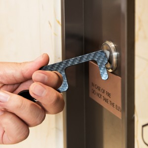 Portable contactless carbon fiber key chain bottle opener